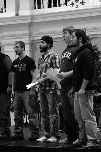 Members of the Madrigal Singers rehearse Wednesday evening for their holiday performance this Friday and Saturday at 7:30 p.m. in the Memorial Union Ballroom. Alissa Miller/ The Bulletin