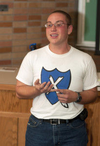 Andrew Leigh Bullard, library science graduate student, speaks on issues regarding transgender individuals Tuesday night in Science Hall, room 72, at “Voices of Witness.” Leigh came out as a transgendered individual in spring 2011 at P.R.I.D.E.’s Alternative Beauty Pageant.Yohan Kim/The Bulletin