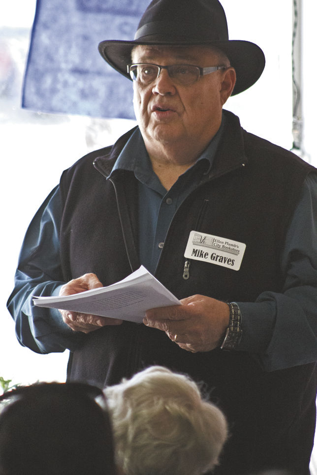 Mike Graves reads a passage from one of his book manuscripts during the Author Showcase at Ellen Plumb&#8217;s Bookstore on Sunday January 29. The event was in celebration of Kansas Day and included a variety of authors including ESU&#8217;s Kevin Rabas and Amy Sage Webb.