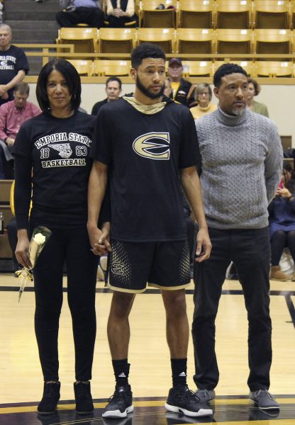 Jevon Taylor, senior guard, and his parents, are recognized on Saturday for senior night before the men’s basketball game in the White Auditorium. Seniors on the cheer squad and women’s basketball team were recognized as well.
