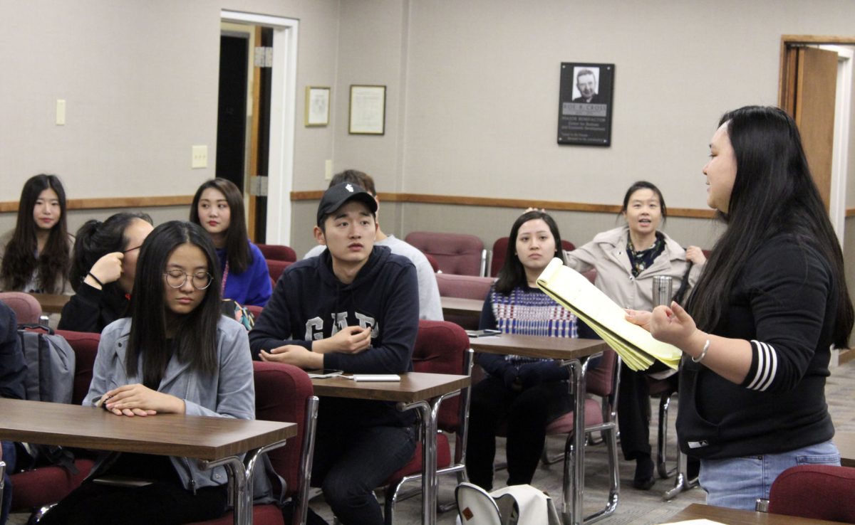 Hailin Chen, senior accounting major and president of the Chinese Student Association, starts off the organization&#8217;s meeting on Tuesday in the Roe Cross room. The group met to finish up their plans for the International Food Festival on Saturday and used the time to decide who would be bringing what dishes.&#160;