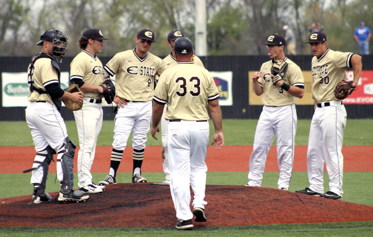 ESU head baseball coach #33 Bob Fornelli walks to the mound to make a pitching change in Sunday&#8217;s home game against Central Missouri at the Trusler Sports Complex. The Hornets defeated the Mules 9-8.