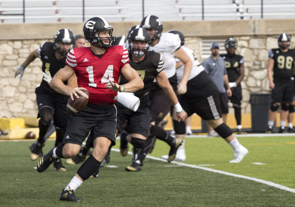 Braxton Marstall,redshirt junior quarterback looks for an opening to pass during yesterday afternoon&#8217;s practice at Welch Stadium. In 2016, Marstall was an honorable mention All MIAA Selection and was named a preseason All-American quarterback this year.
