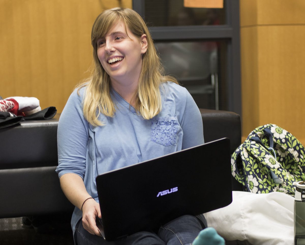 Hannah Jeffers-Huser, senior social science education major, participates in an activity during the Quivira meeting Monday in Plumb Hall. Jeffers-Huser is publishing her first novel, &#8220;What Lies Beyond,&#8221; which is currently available for purchase.