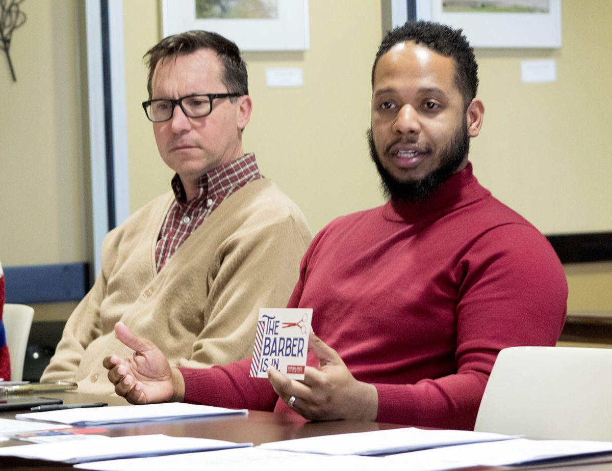 Mark Daly, dean of international education, listens as Jason Brooks, co-chair of the alliance and assistant dean of students for for Diversity, Equity and Inclusion, talks about the new alliance initiatives. The next meeting will take place in April.