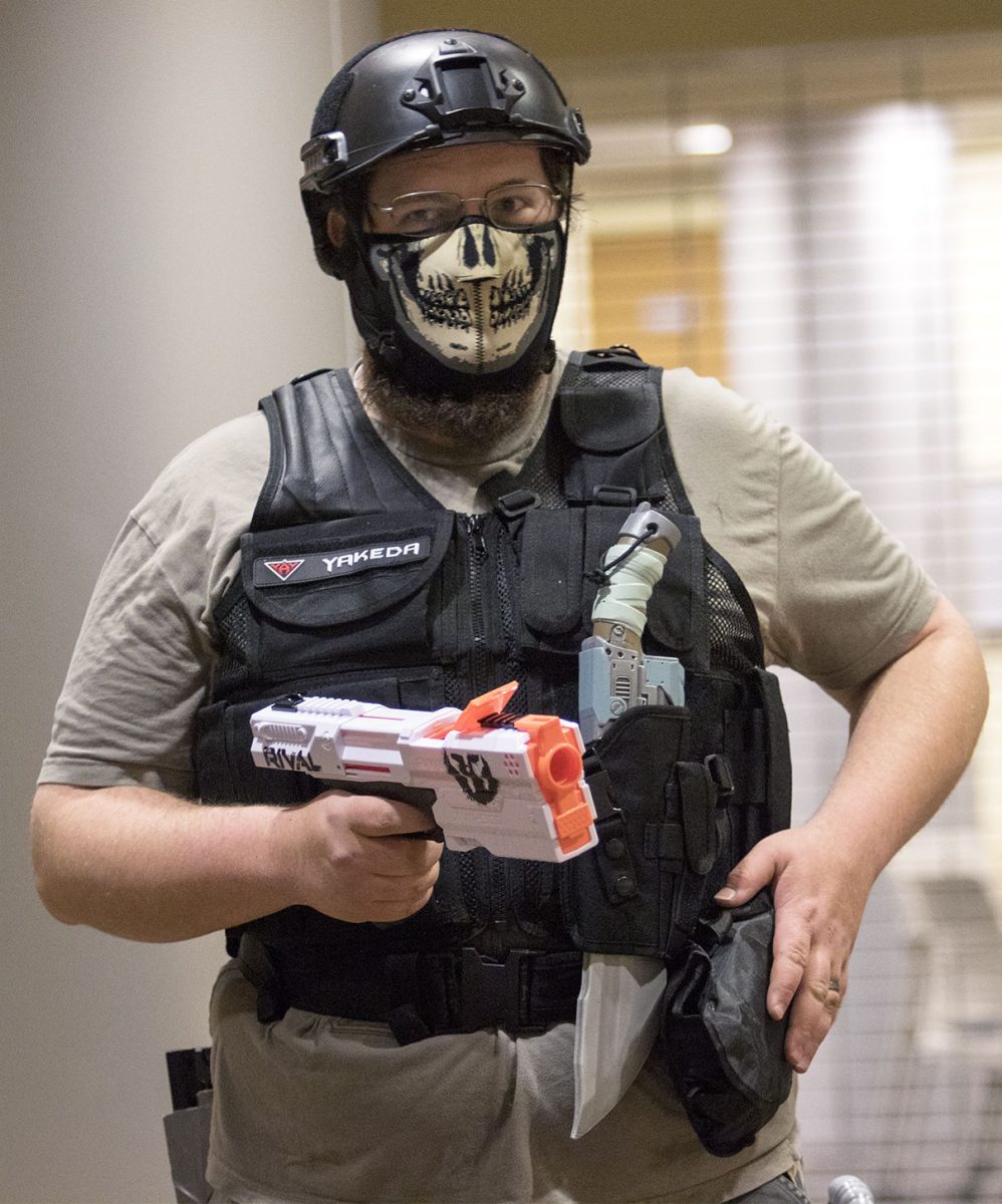 Brad Roush, third year member of Nerf Nation and junior fine arts major, prepares for the next round of Team Deathmatch. Over the course of the year, Nerf Nation has made changes such as only having orange tips on the guns due to the concealed carry law and meeting monthly because of new Memorial Union policy.