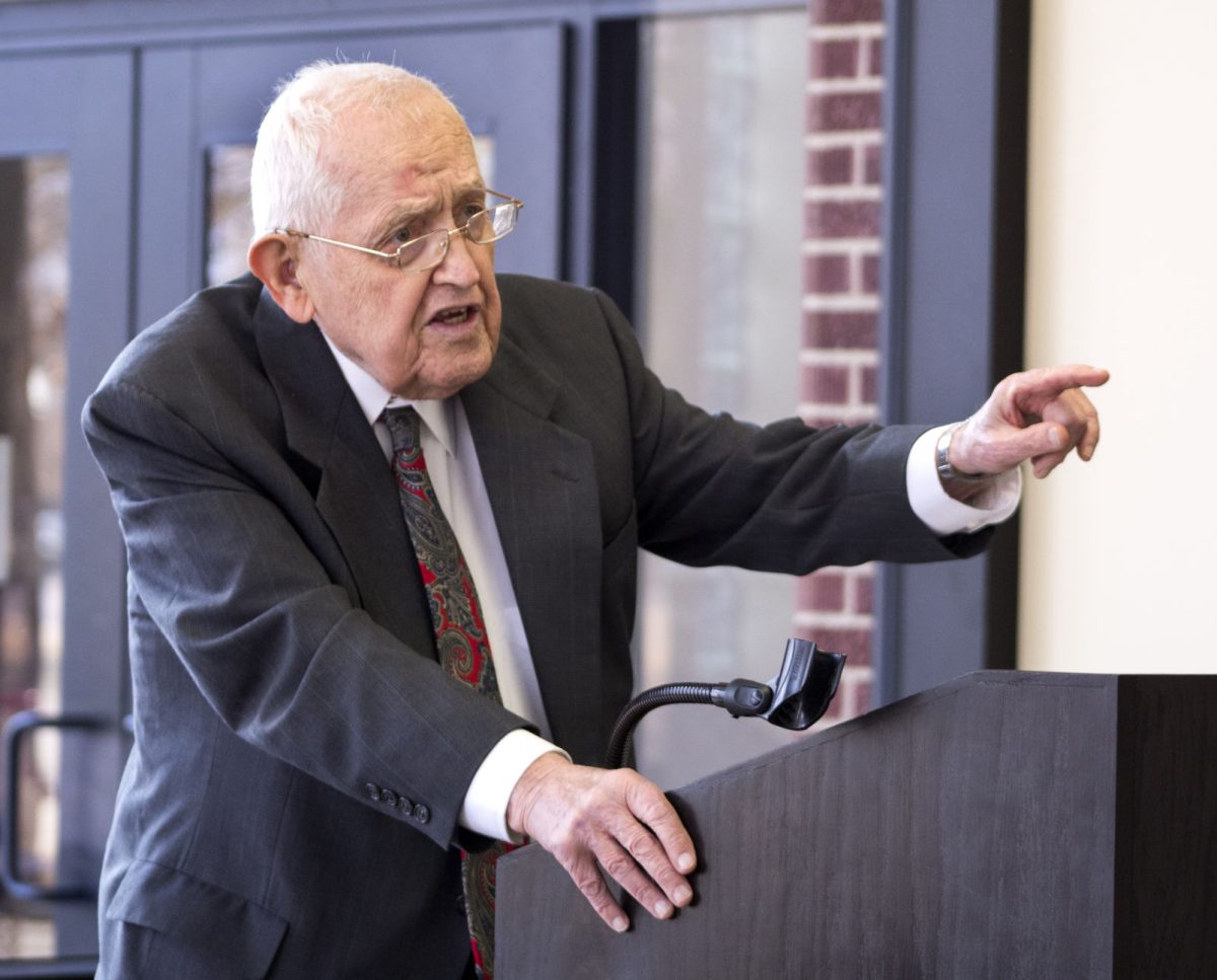 Loren Pennington, Roe R. Cross emeritus professor of history, performs a Reader&#8217;s Theater about William Allen White last Friday in White Library. The performance was part of White&#8217;s 150th birthday celebration.