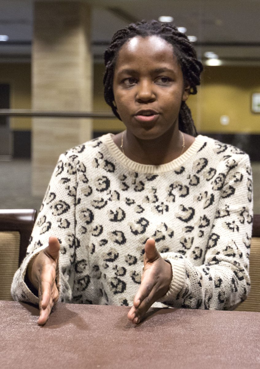 Calandra Matoushauge, freshman biochemistry major, panelist and international student from Zimbabwe, talks about her country&#8217;s education system during the International student panel event last Thursday in the Kanza Room. Other topics that were discussed include how education differs between countries, the expectations of international students, and goals that the students have.