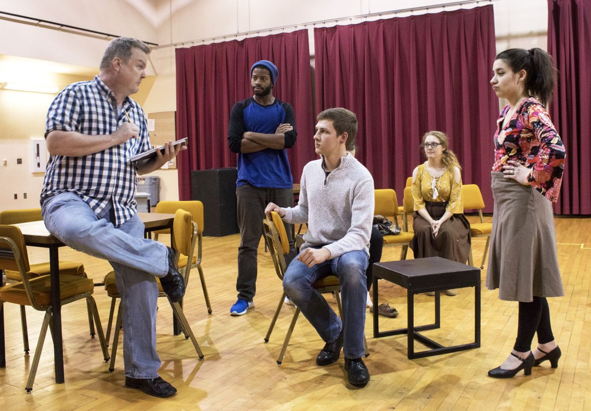 Robert Hart, theatre instructor and director of &#8220;He and She,&#8221; informs Harriel Mack, senior communication major, Ryan Wollum, freshman speech and theater education major, Torin Horvik, junior art and theatre major and Elizabeth Tate, freshman theatre and communication major, that the &#8220;He and She&#8221; play will run the full three acts, instead of cutting it down to two like had been previously discussed. The play opens at 7:30 p.m. Tuesday, March 6 and runs through March 10, with a 2 p.m. showing on Saturday in the Fredrickson Theatre.