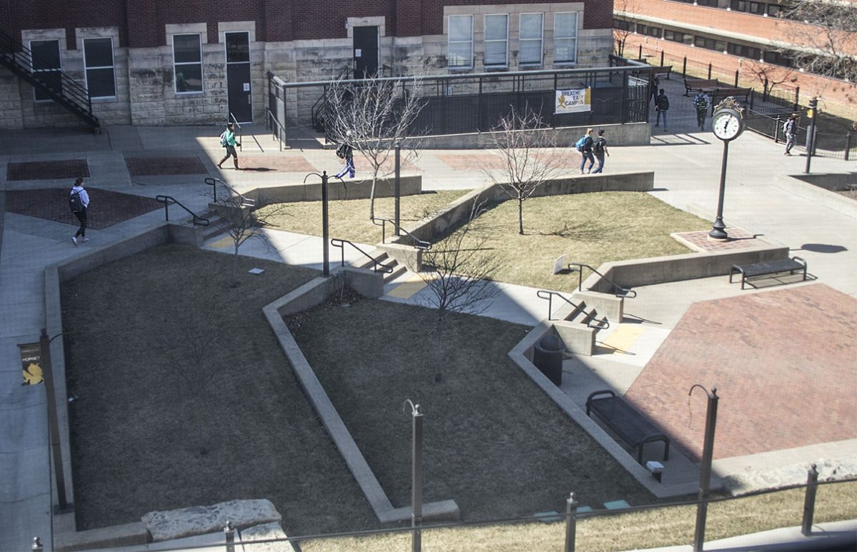Students pass through the union square area between classes yesterday on campus. The union square, along with the sunken garden and quad area between Beach Music Hall, King Hall, Memorial Union, and Roosevelt, are designated free speech areas on campus.