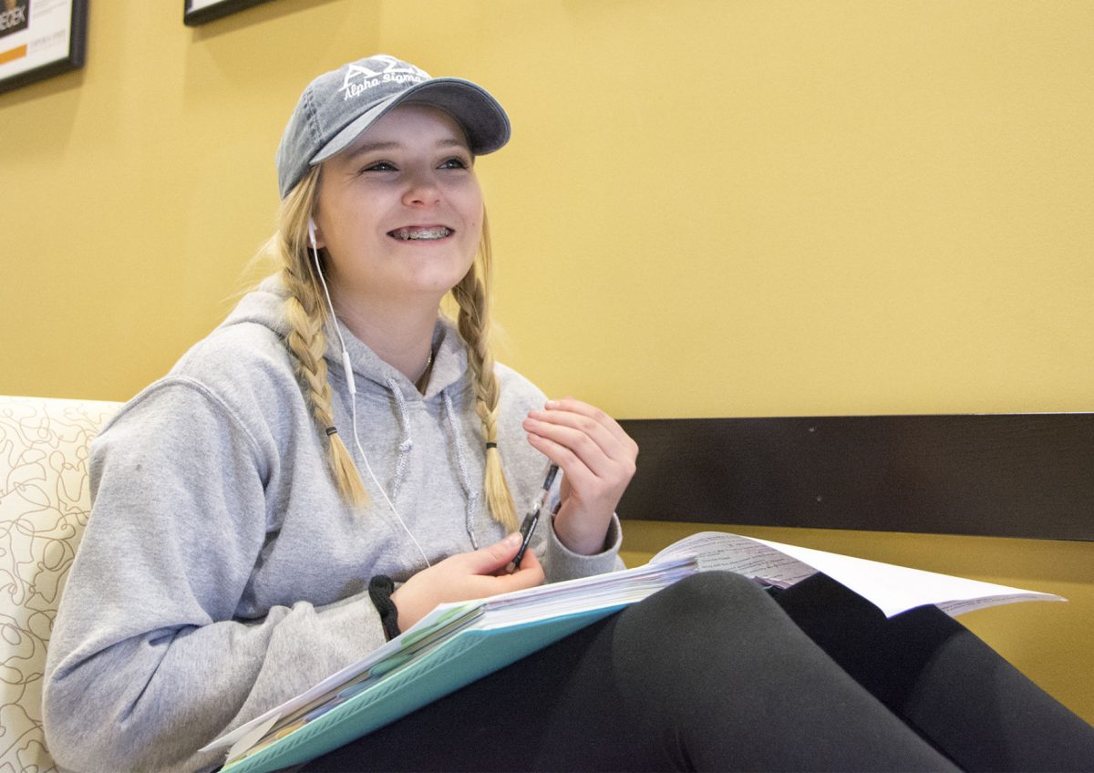 Mercedez Kalp, freshman elementary education major, works on homework, Monday in the Memorial Union.&#160; Out of over 35,000 applicants, Kalp was one of the 4,000 to receive an internship for Disney next fall semester in a custodial position.