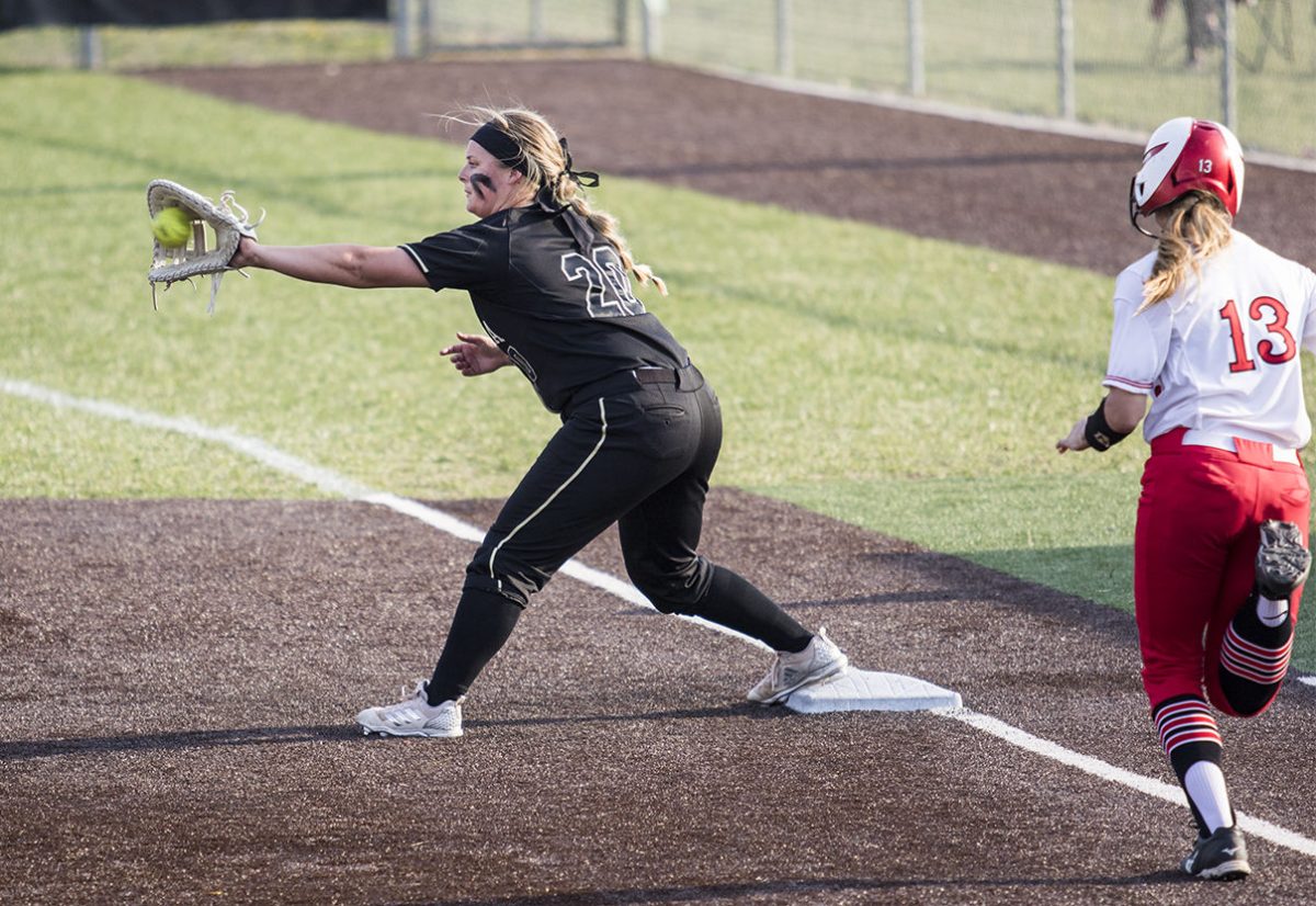 Danielle Sprinkle, senior first base, catches the ball to get out a Jennies player during a game against Central Missouri on Friday at Trusler Sports Center. Sprinkle hit a homerun during the Friday game, which assisted in a Hornet win, 4-2.