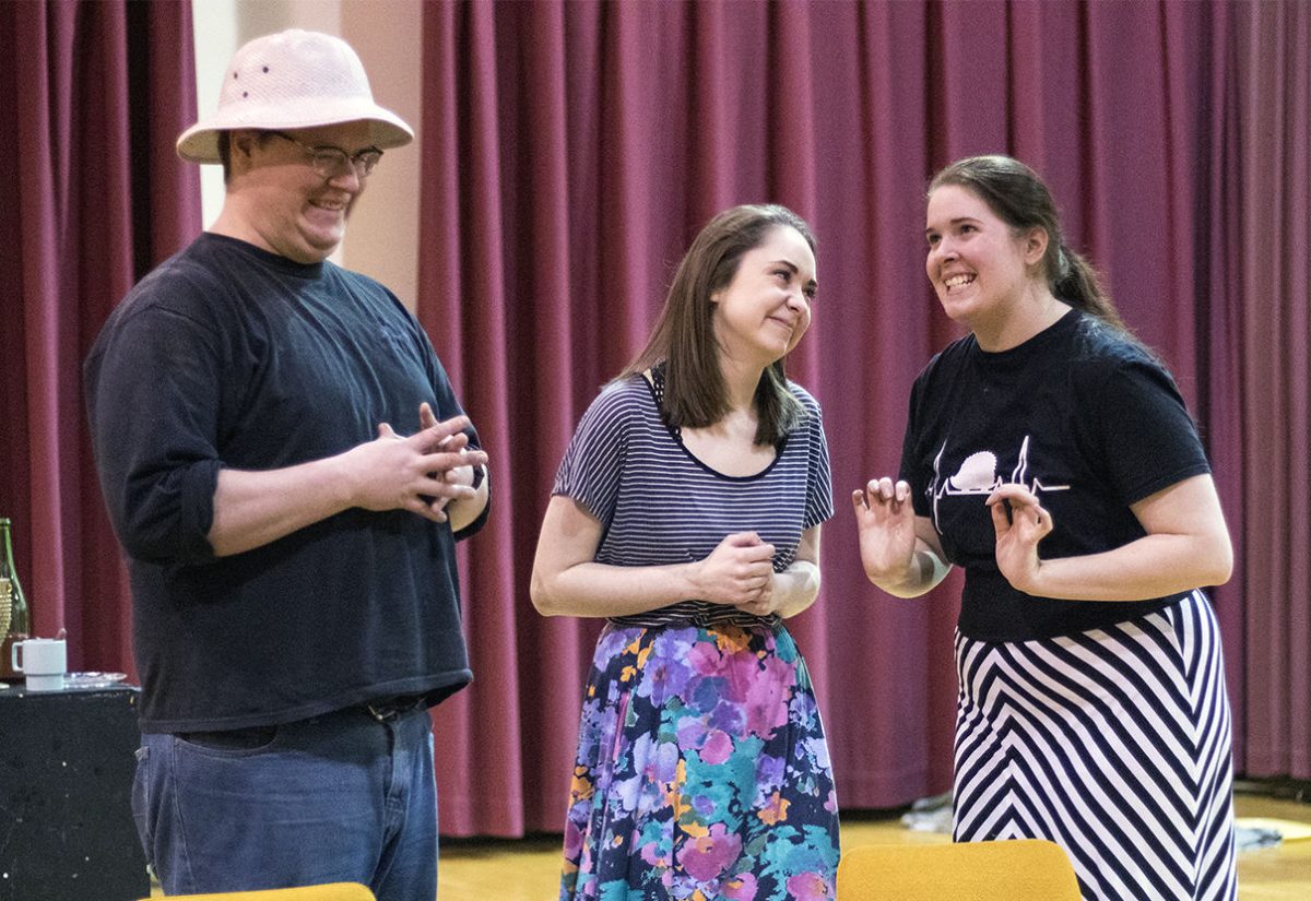 Chris Lohkamp, scene shop manager and technical director, Rachel Muirhead, senior theater and speech education major, and Miranda Kimble, junior theater major practice a scene from &#8220;Arsenic and Old Lace.&#8221; Tickets will be $5 for students, $12 for regular admissions and $11 for seniors for the play which will open 7:30 p.m. April 25 in Bruder Theatre.