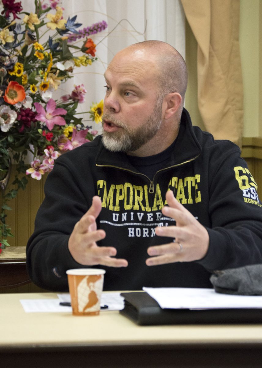 Steve Lovett, director of business career services and assistant business professor, discusses the tuition and fee increase in the Veterans Hall of Honor last Thursday. The current proposal is 2.59 percent overall. &#160;