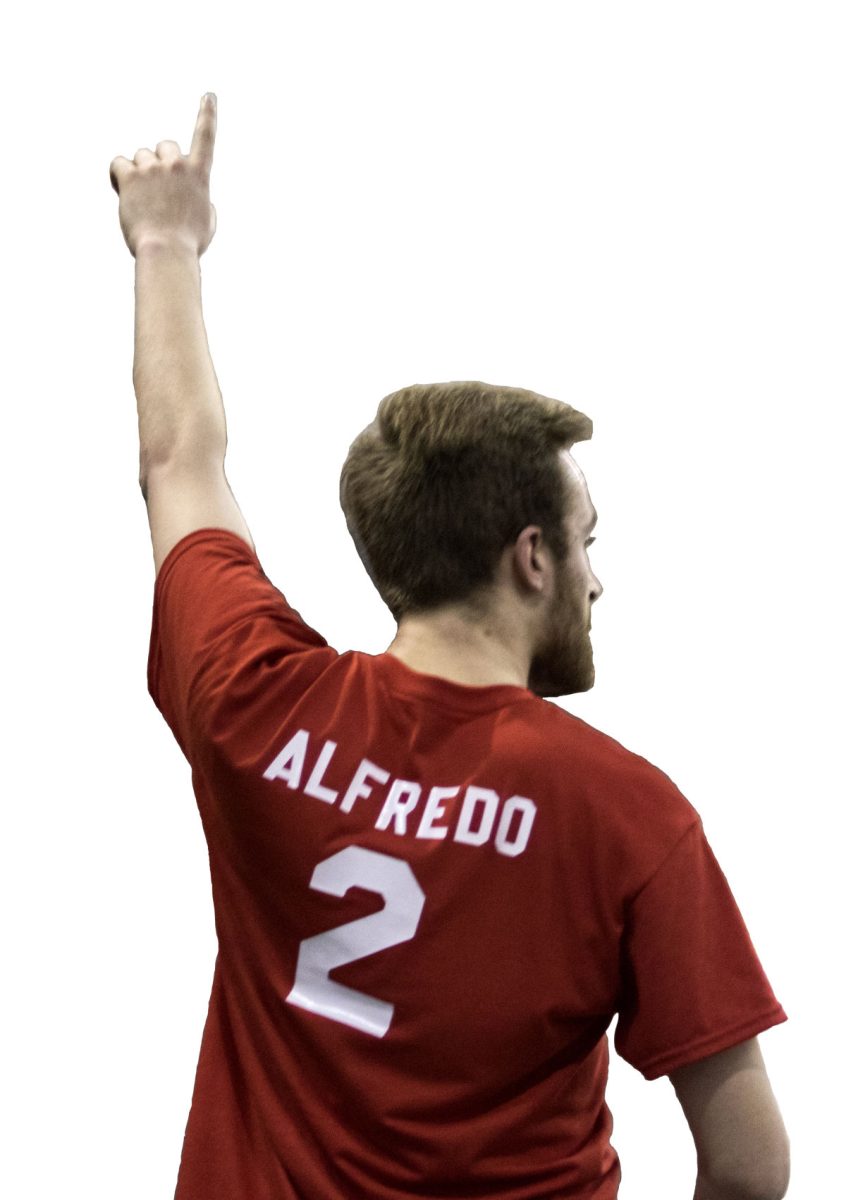 Diaz-Serrano signals to a teammate during an&#160;intramural&#160;basketball game.&#160;