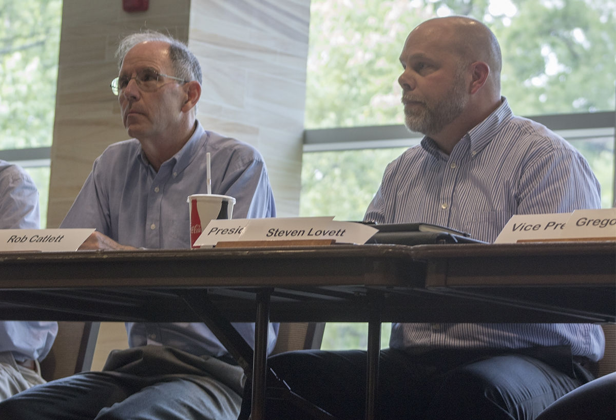 Rob Catlett, past president and professor of economics, and Steve Lovett, president of Faculty Senate and&#160;assistant professor of business administration, discuss implementing workgroups to expedite the process of creating legislation. There were several concerns about the work groups, including their role, what power they would have and if they were subject to the open meetings act.&#160;