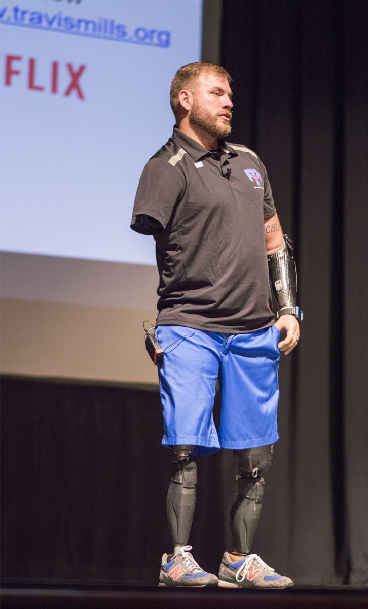 Travis Milles, a retired army soldier and quadruple amputee, shares his story last Wednesday in Albert Taylor Hall. Mills gives motivational speeches around the country with the motto "never give up, never quit", according to travismills.org.