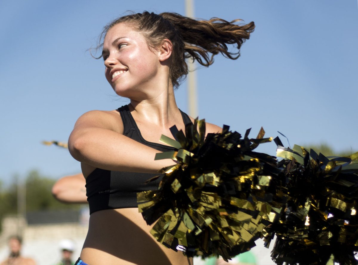 Sophie Adams, junior nursing major, practices a routine for a half time performance with the new Stingers dance team Friday at Welch Stadium. The team started as a club last year but has become official under the athletic bands this year.