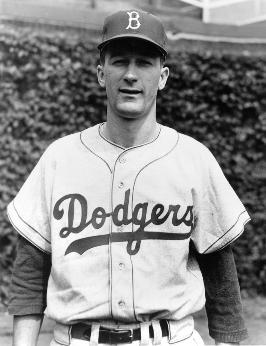 Posing for a photo, Fred Kipp, Emporia State alumni and author, stands in his Dodgers uniform in the 1950s. Kipp played Major League Baseball for 10 years.