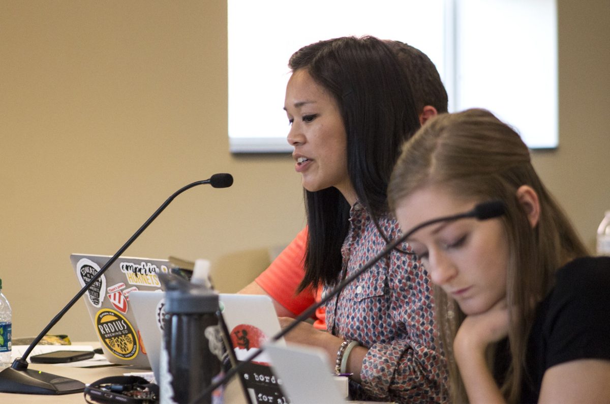 Kim Nguyen, chair of the Diversity and Inclusion Committee and graduate student in art therapy and clinical counseling, and Amy Oelschlaeger, Senate Operations Committee chair and senior elementary education major, give their committee reports during the Associated Student Government meeting last Thursday. Nguyen spoke about the bill ASG passed that requires senator to attend a diversity event once a semester.&#160;
&#160;