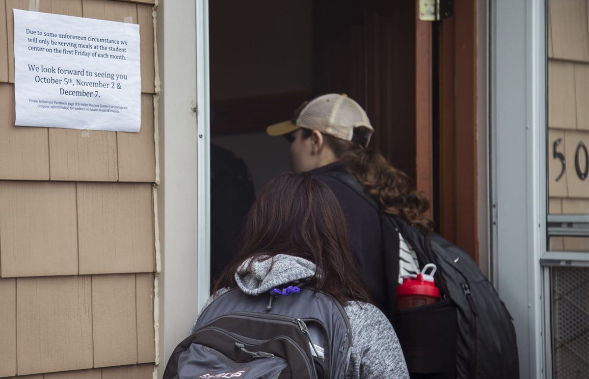 Students enter the Christian Student Center, 1503 Merchant St., Oct. 5 for Spaghetti Friday. The center is changing the weekly meal to only the first Friday of each month due to a large influx of attendees.&#160;