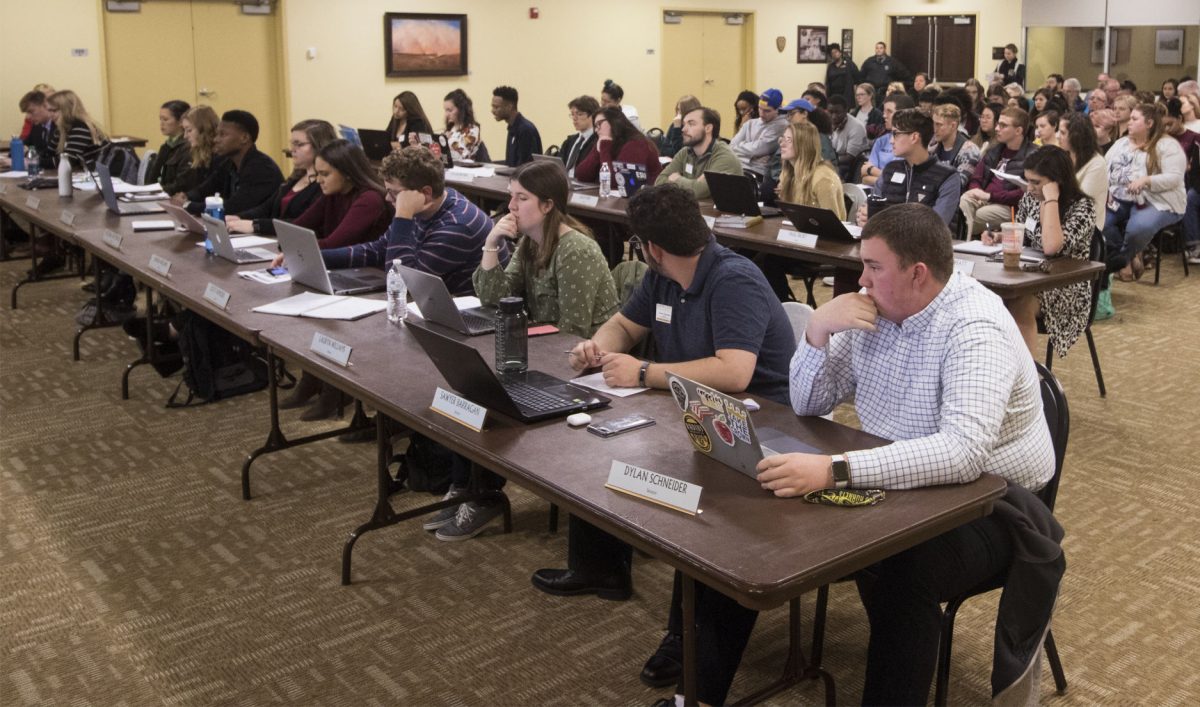 Senators consider a motion to impeach Michaela Todd, senior communications and political science major, during last Thursday's senate meeting in the Preston Family room. The motion failed 12-1-6.