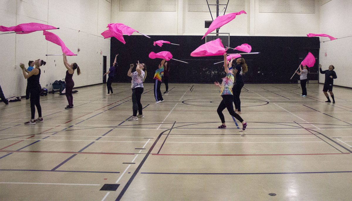 The Emporia State Winter Guard practices last Thursday in a HPER gym. The team will be performing March 5 at Emporia High in the upcoming dance extravaganza.