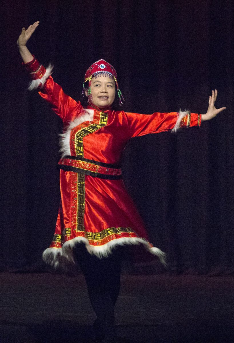 Joyce Zhou, interim chair of business administration, performs at the Asian Festival Saturday in Albert Taylor Hall. The festival celebrated traditional music, clothing, and dance from Korea and China.