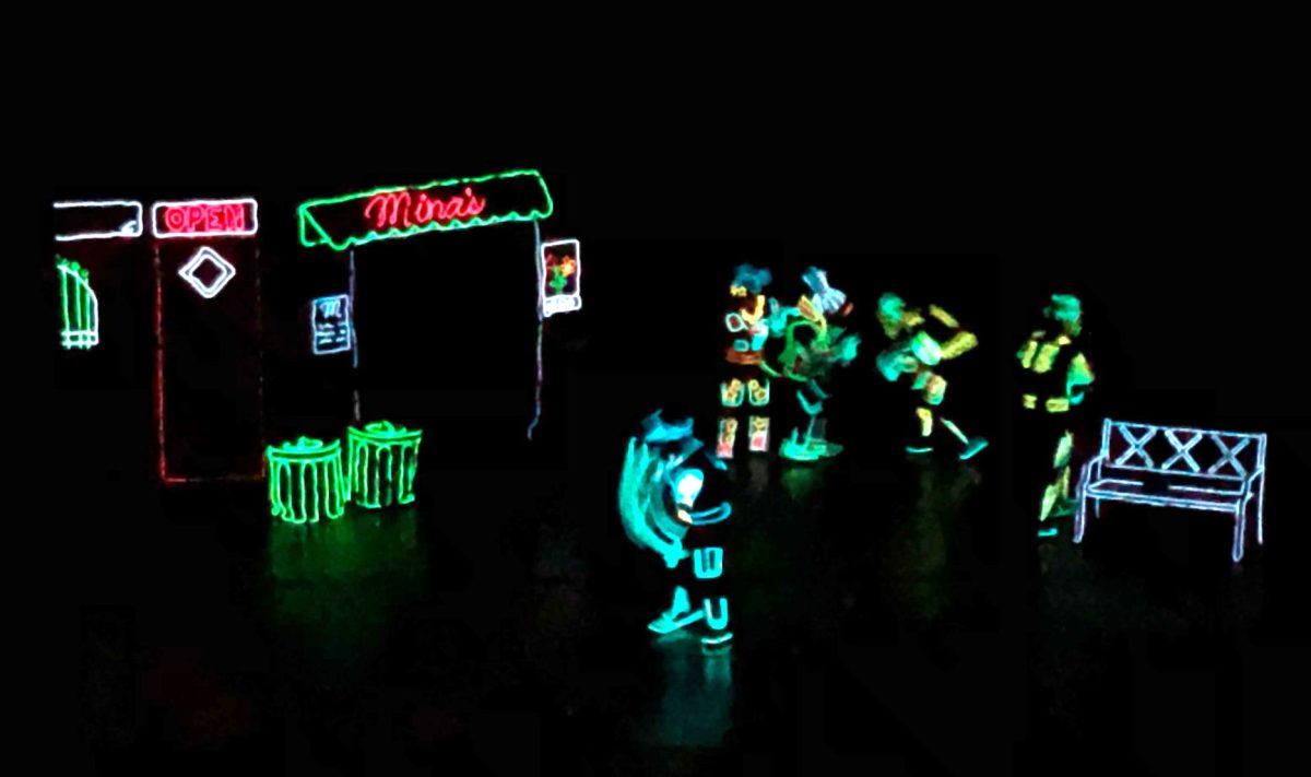 iLuminate performed in glow-in-the-dark suits on a&#160; blackout stage Monday night in Albert Taylor Hall for members of the Emporia community. The company asked for audience participation after the Finale for their upcoming YouTube video.&#160;