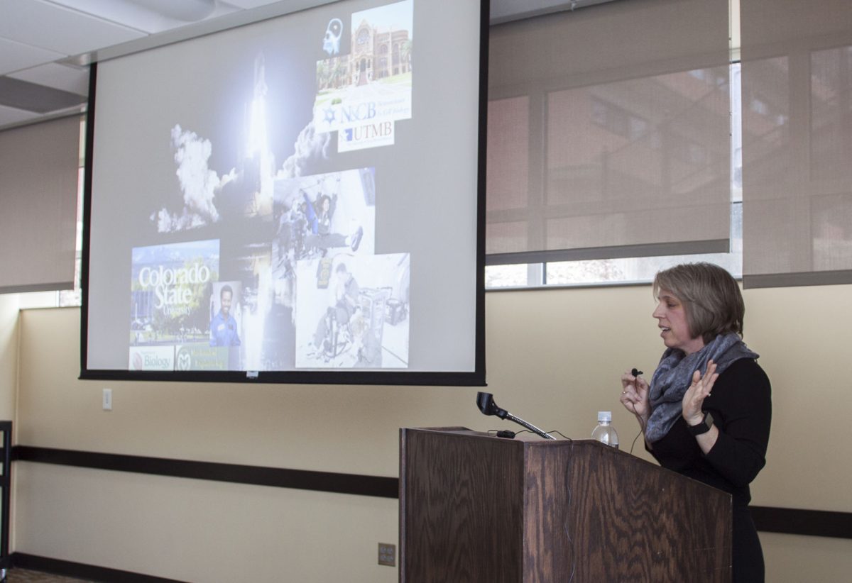 Tara Ruttly, TRIO keynote speaker, NASA associate chief for microgravity research and McNair Scholar, speaks about her experiences as a McNair student in front current McNair scholars on Friday in the Memorial Union.&#160;