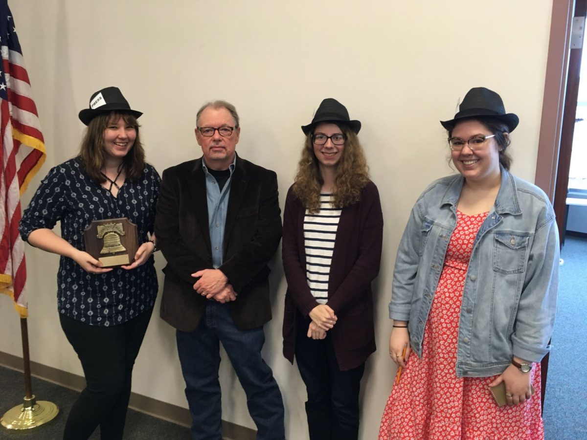 Sarah Spoon, current Editor-in-Chief of The Bulletin and senior Spanish and English major, Max McCoy, adviser to The Bulletin and investigative reporter, Allie Crome, senior secondary education major, and Margaret Mellott, Editor-in-Chief of The Bulletin next year and sophomore history secondary education major, stand with the Liberty Bell Award.&#160;The speaker at the event was&#160;Matthew D. Keenan, a lawyer with Shook, Hardy &amp; Bacon, who said&#160;The Bulletin's work would make William Allen White proud.