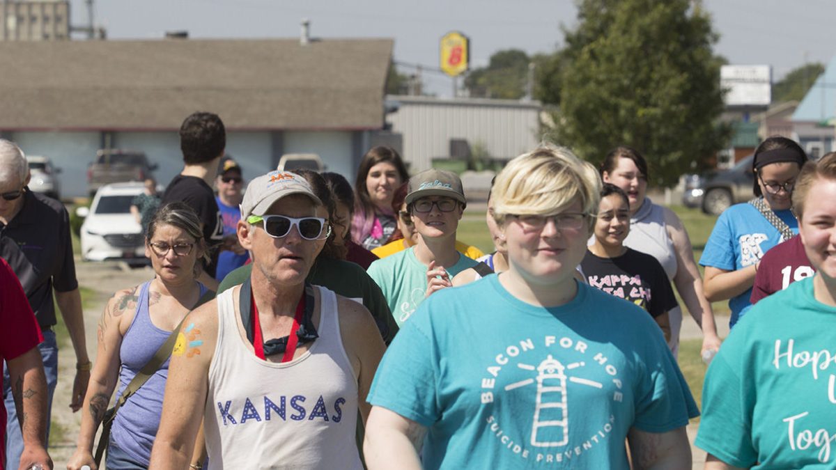 Community members walk to help spread awareness about suicide prevention month on Sept. 7. They began their walk in the Clinton Boyer building and looped back around to end there as well.&#160;