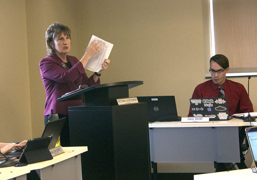 Diana Kuhlmann, vice president of administration and finance, explains the tuition rise to the senators, on Sep. 19, in the Senator Chamber. The administration and finance office made this decision last spring.&#160;