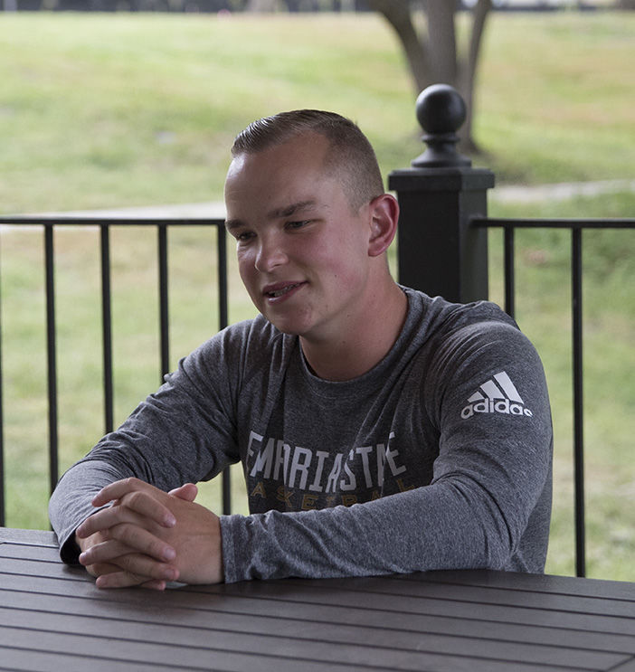 Justin Tucek, senior history major, shares about growing up playing basketball with his brothers, on Sept. 19. Tucek said he is very passionate about basketball and loves working with the team.&#160;