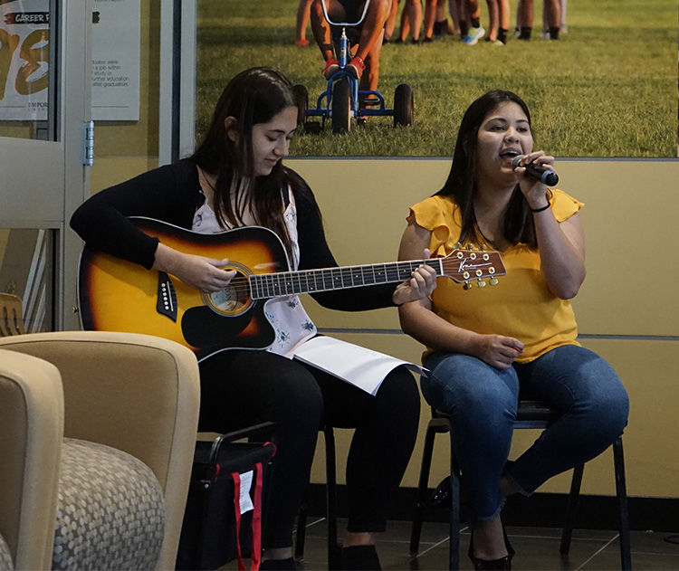 Cindy&#160;Silvero&#160;Navarro, sophomore music major&#160;and&#160;Micaela Sandoval&#160;Ariste, junior biology major,&#160;perform&#160;a special song. Both of them are international students from Paraguay.
