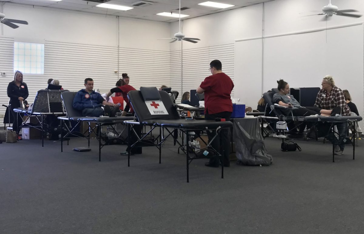American Red Cross workers gather donations at the Flint Hills Mall. The blood drive was ran in part with the help of Emporia highschool students who were helping to raise money for their prom.