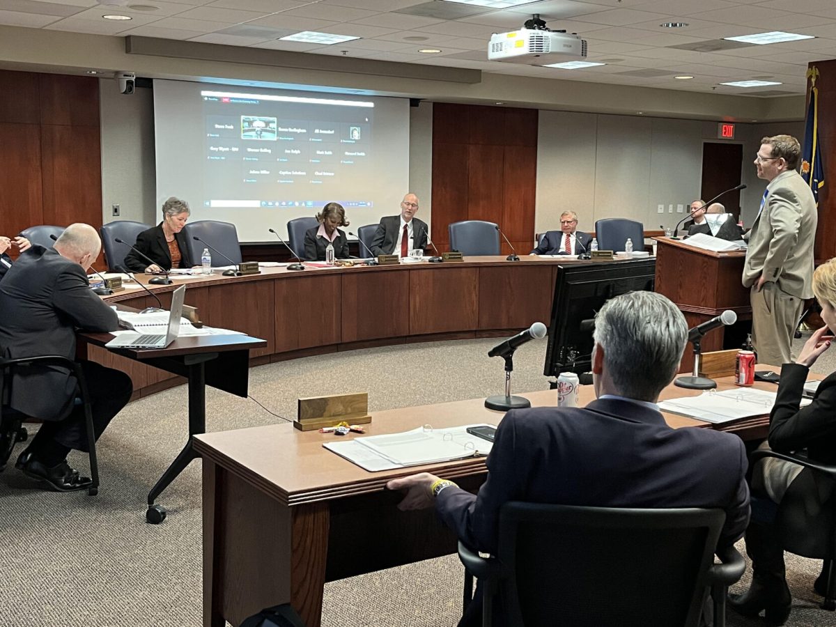The Kansas Board of Regents listen to various speakers at their February meeting on Feb. 16 in their Topeka offices. During this meeting, they approved the list of members for the Emporia State presidential search committee. The next step for the committee will be to build an ideal leadership profile for the next ESU president.