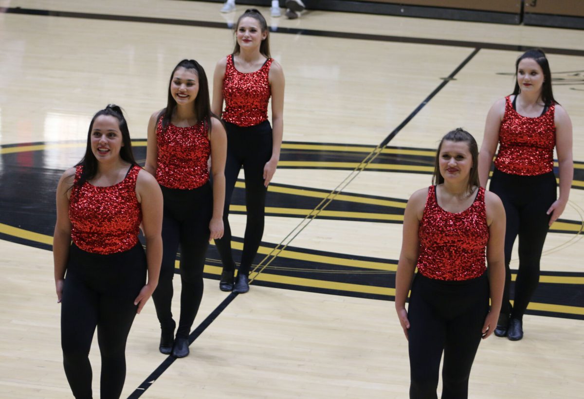 The Emporia State Stingers Dance Team performs during halftime of the ESU men&#8217;s basketball game against Nebraska Kearney on Dec. 2nd in the William Lindsay White Civic Auditorium.