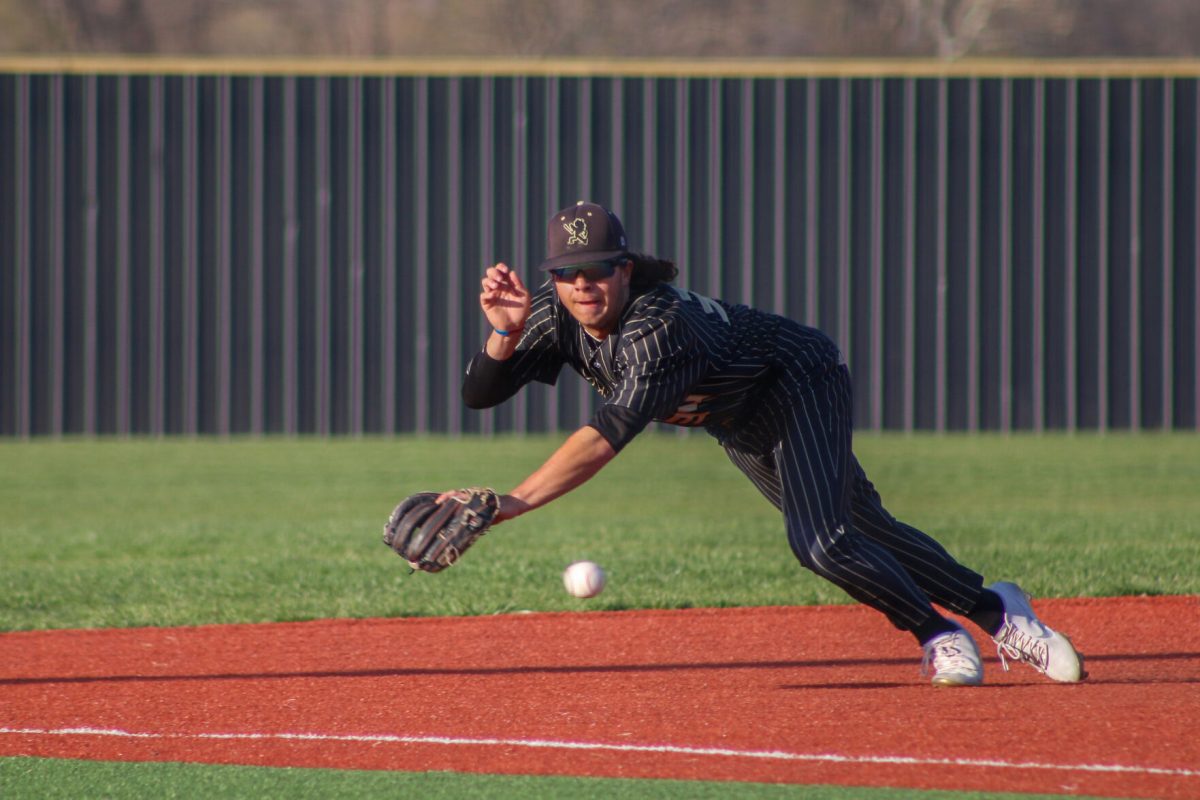 Kadyn Williams freshman business administration major dives to stop a ball headed down the third baseline. The Hornets take the first game with a score of 5-1, however fall short in the second game with a score of 1-2. Emporia State is now 16-25 on the season and 10-17 in MIAA play.