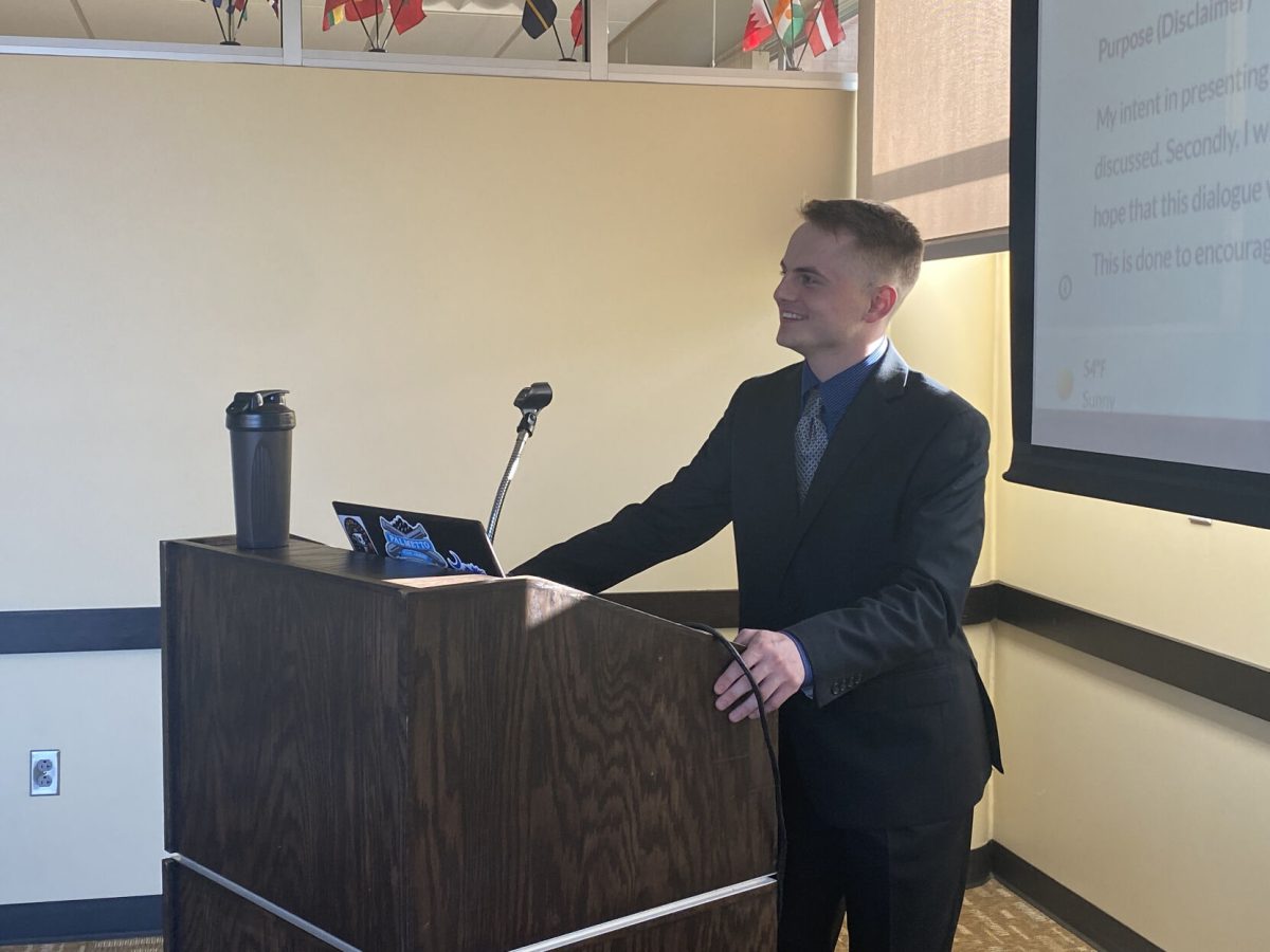 Ian Howell prepares to give his presentation "End the Awkward'. Howells family and friends attended to support him and take photos as he shared his community engagement project.