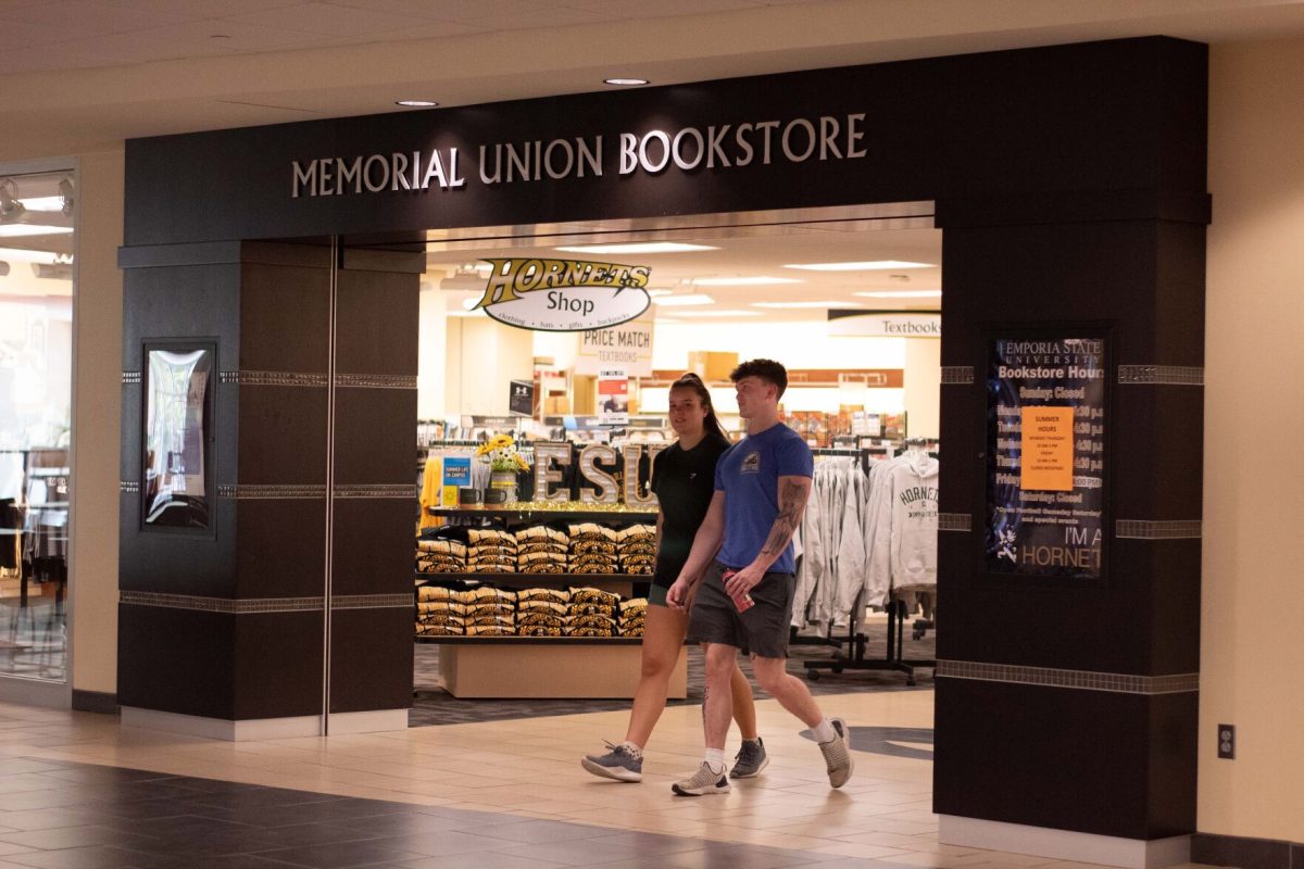 Taten Rooks, sophomore physical education major, and Isabella Weber, sophomore business administration major, leave the Memorial Union bookstore on Aug 2.