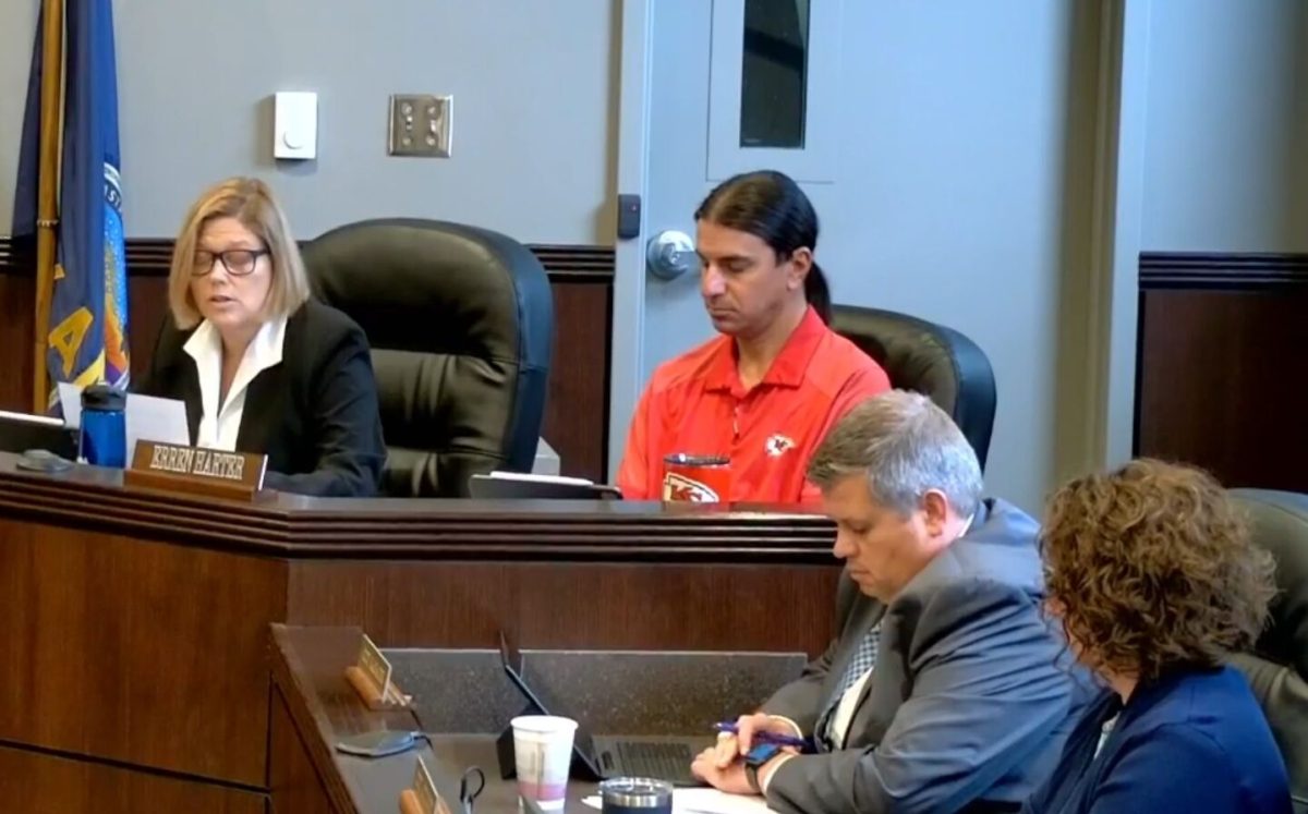 City Commissioner Susan Brinkman delivers a personal statement calling for ESU president Ken Hush to share his sources and reveal the plan for restructuring the university. (Screenshot from video recording of meeting)