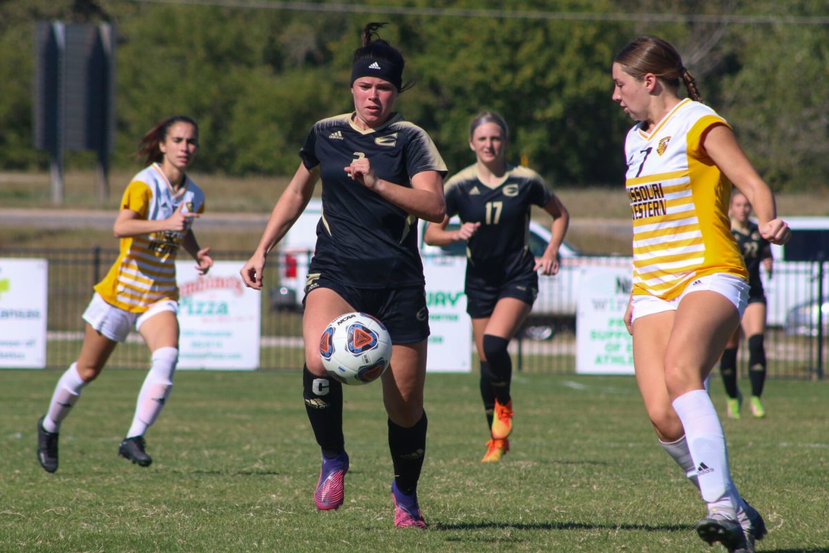 Mackenzie Dimarco senior, attemps&#160;a fast break past MWSU midfielder.