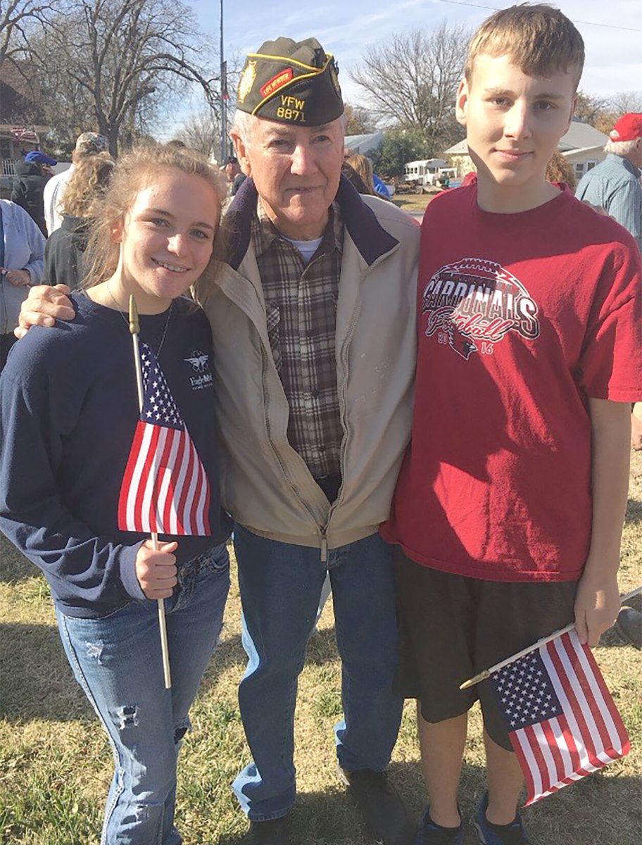 Jami Morain and her cousin Isaiah Russell celebrate Veterans Day with their uncle Jack Selbe in 2016.