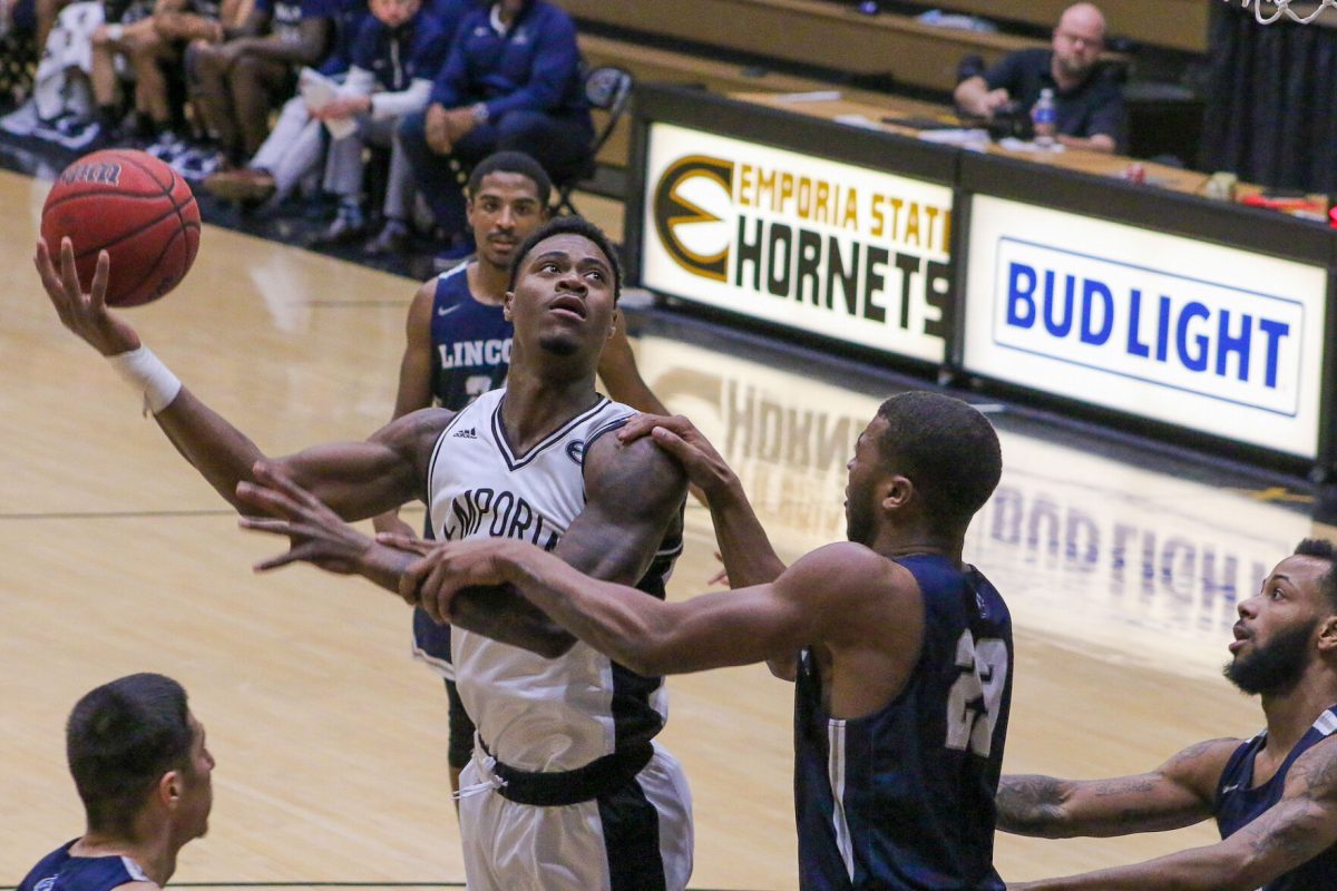 Tyreek Robinson junior, human health, and performance major goes in for a layup against Lincoln University on Feb. 12, 2022. The&#160;hornets took a 48-33 lead a half. Robinson scored three total points in the game and helped contribute to an Emporia State win over the blue tigers 90-71.