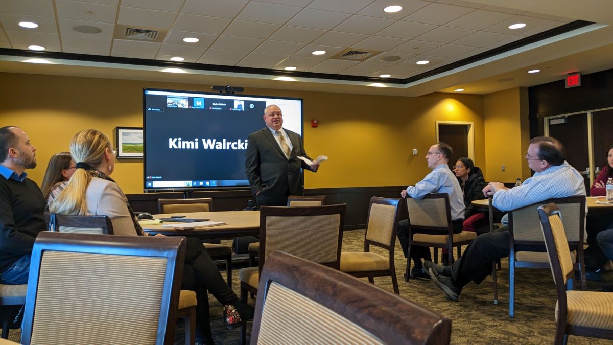 Emporia State Provost, Brent Thomas, presents potential restructuring options during LAS meeting. His goal is to make more official decisions by this summer.