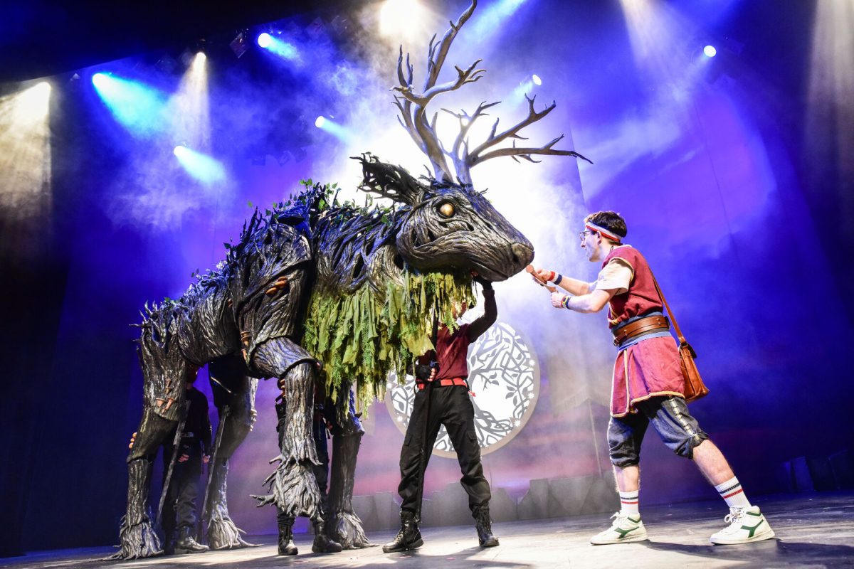 Cast members direct an Indrik on stage during a performance of Dragons and Mythical Beasts, a show that is set to come to Emporia Feb. 25. The show will take place at Emporia State&#8217;s Albert Taylor Hall and is free for all ESU students.