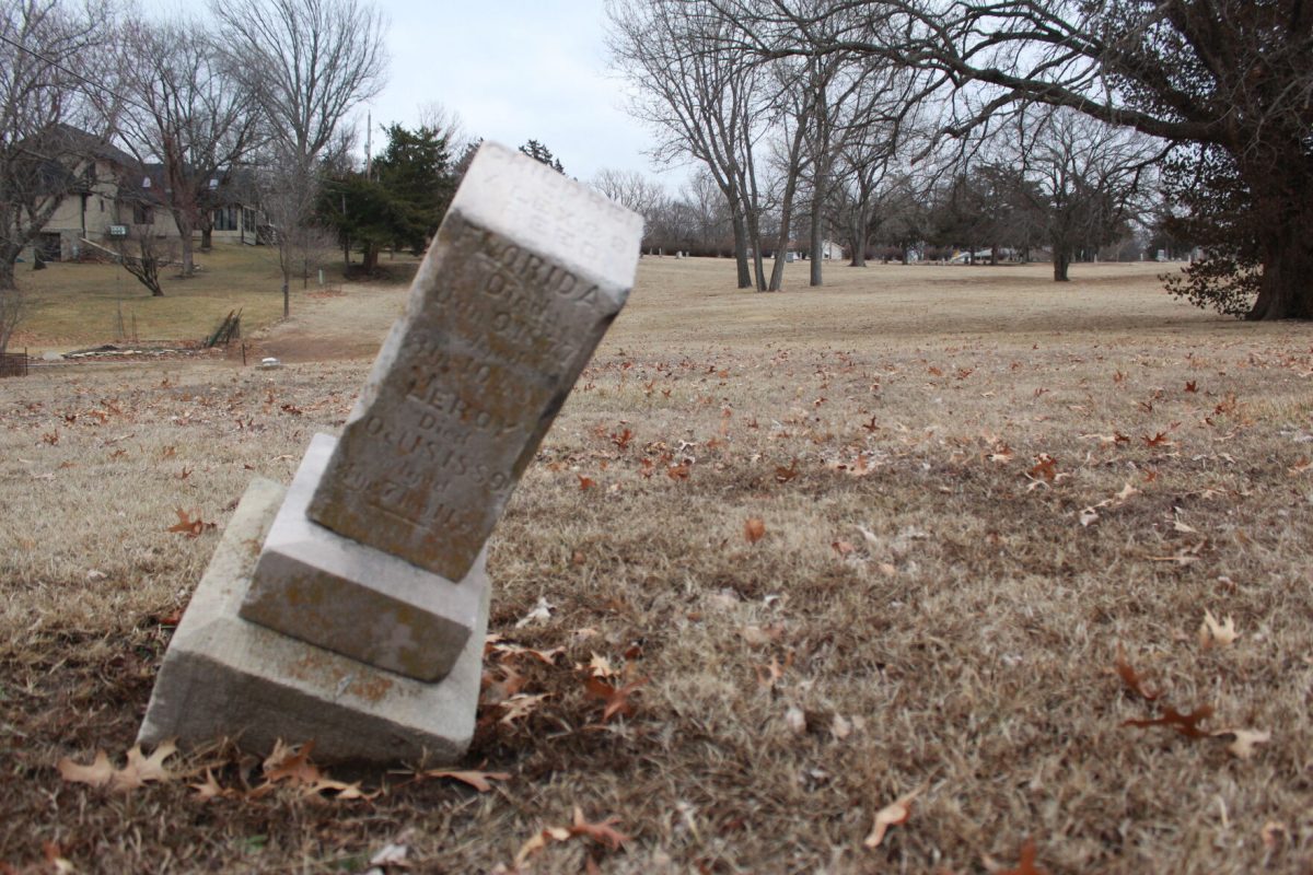 One of the few marked burials in Potter&#8217;s Field leans to the right and dates as far back as 1877. Tombstones at this time were made of sandstone which is no longer used today due to the way the rock washes away from weather over the years.