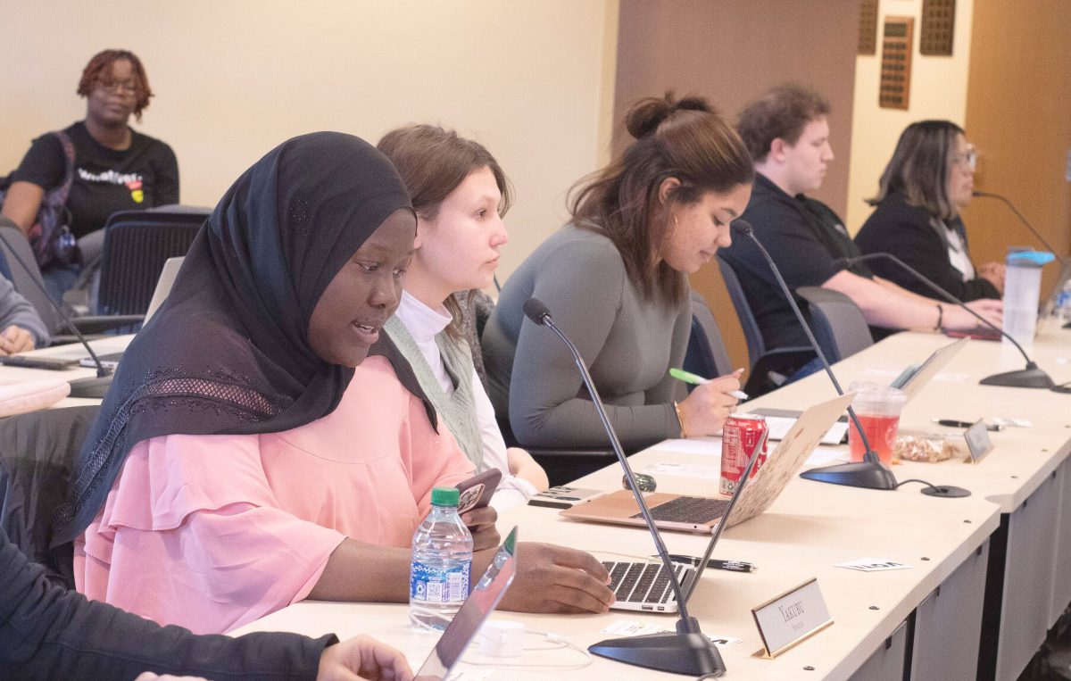 Senator Yakubu reads the bill to recognize The Association of African &amp; Caribbean Students as a recognized student organization (RSO) during the Feb. 23 Associated Student Government (ASG) meeting. The bill passed unanimously.