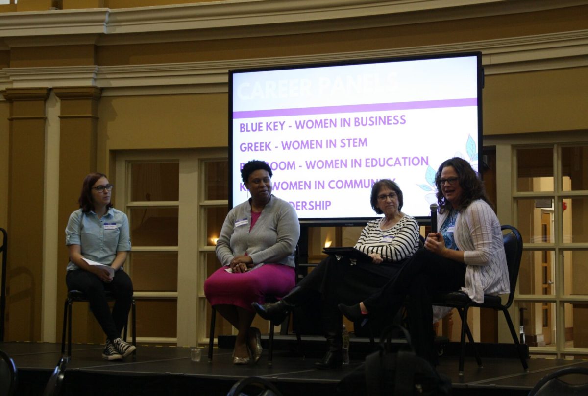 Noah Eppens, senior general studies major, interviews guest speakers about their experience as women in the educational workforce during the lunch networking portion of the March 4 Breaking Barriers event. Breaking Barriers was created in 2021-2022 by Lucy Steyer, then Associated Student Government president.&#160;
